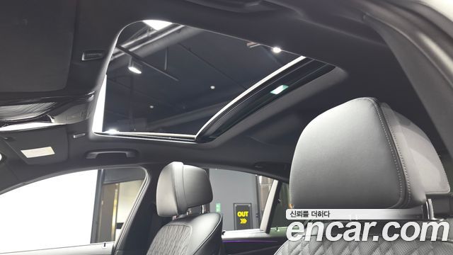 BMW 5-Series 2023 — photo 24