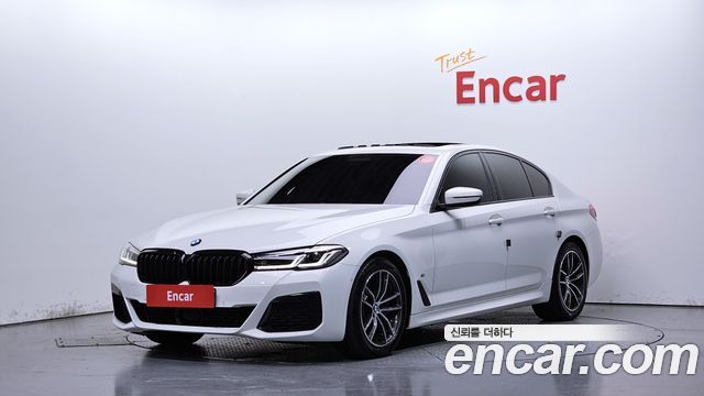 BMW 5-Series 2023 — photo 1