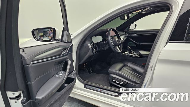 BMW 5-Series 2023 — photo 13