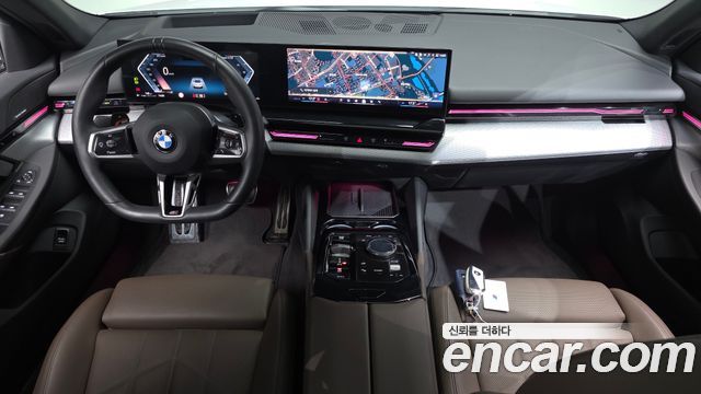 BMW 5-Series 2024 — photo 10