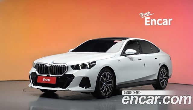 BMW 5-Series 2024 — photo 1