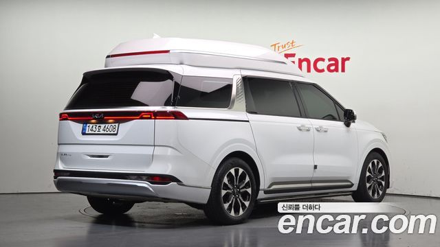 Kia Canival 2023 — photo 2