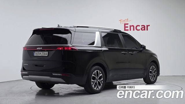 Kia Canival 2023 — photo 2