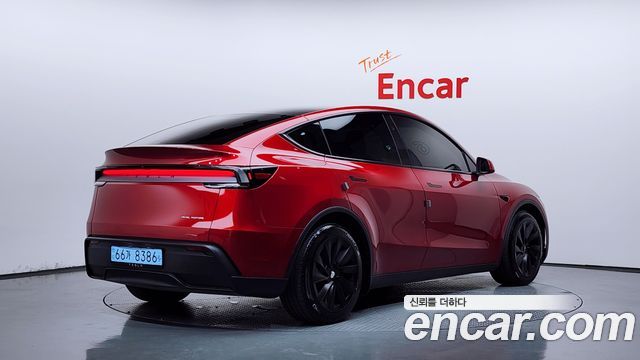 Tesla Model Y 2025 — photo 2