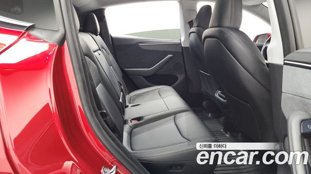 Tesla Model Y 2025 — photo 17