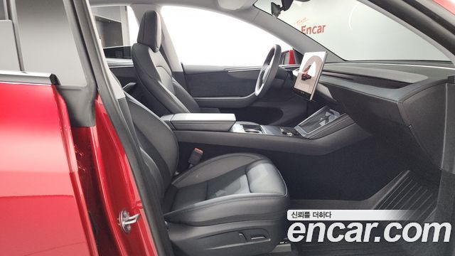Tesla Model Y 2025 — photo 16
