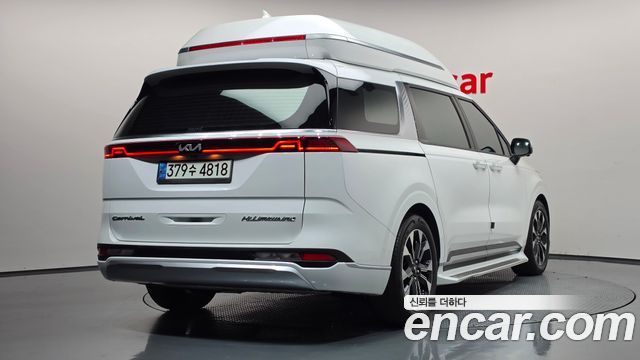 Kia Canival 2021 — photo 2