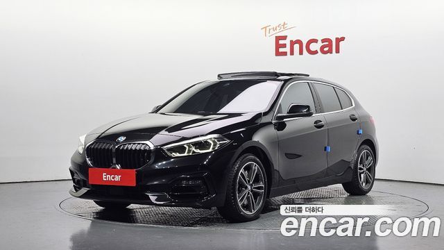 BMW 1-Series 2022 — photo 1