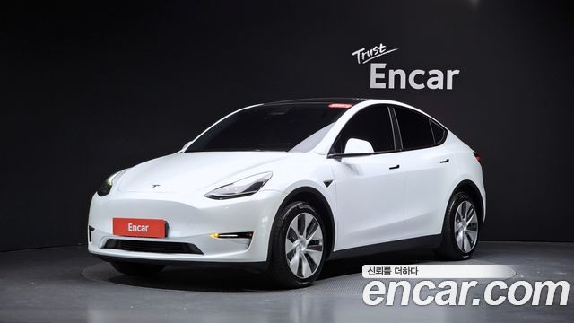 Tesla Model Y 2023 — photo 31