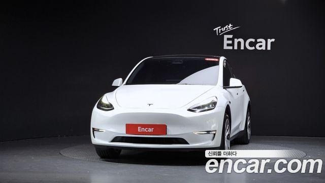 Tesla Model Y 2023 — photo 3