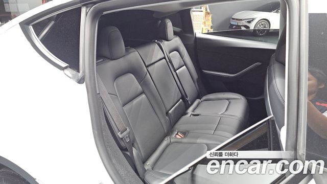 Tesla Model Y 2023 — photo 26