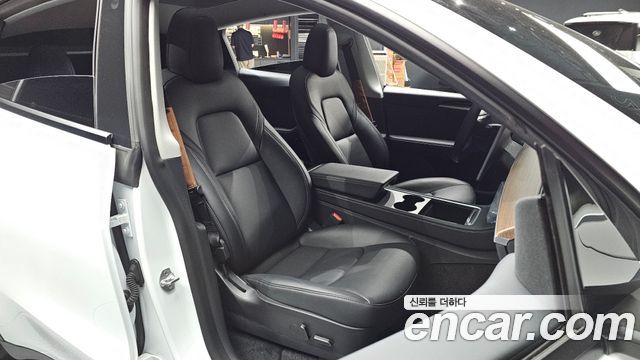 Tesla Model Y 2023 — photo 16