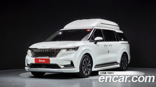 Kia Canival 2023 — photo 1