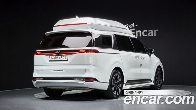 Kia Canival 2023 — photo 2