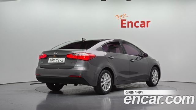 Kia K3 2013 — photo 2