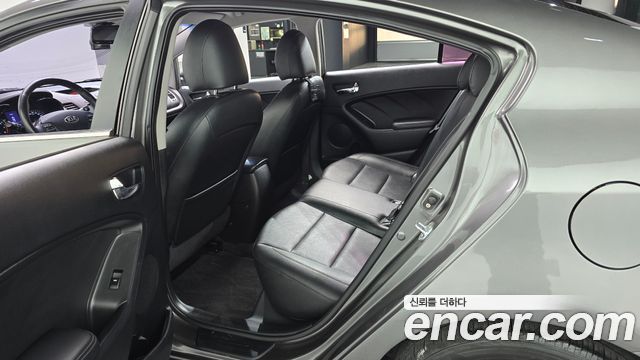 Kia K3 2013 — photo 17