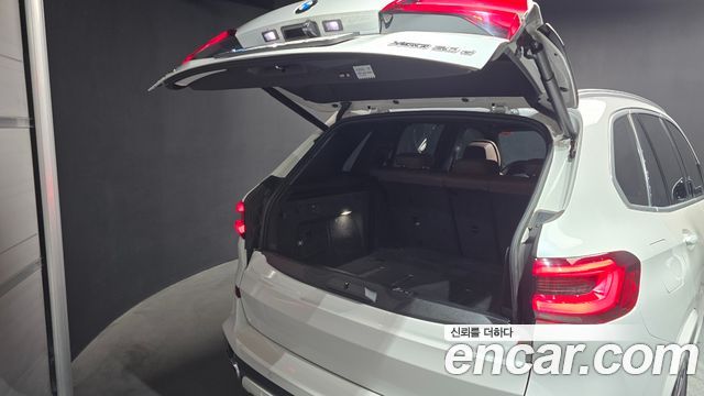 BMW X5 2022 — photo 32