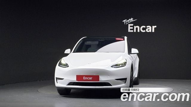 Tesla Model Y 2024 — photo 3