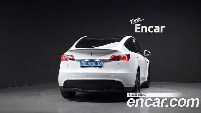 Tesla Model Y 2024 — photo 4