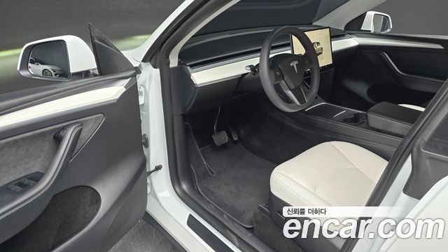 Tesla Model Y 2024 — photo 13