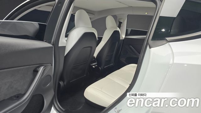 Tesla Model Y 2024 — photo 17