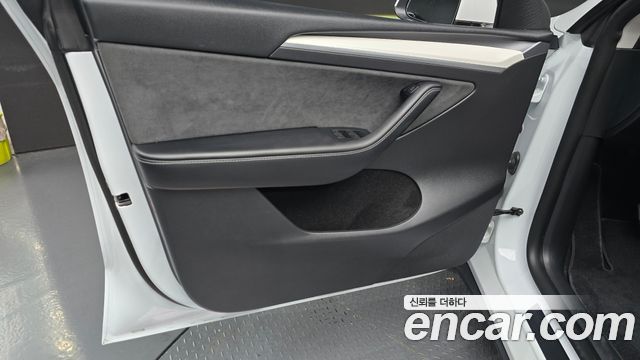 Tesla Model Y 2024 — photo 14