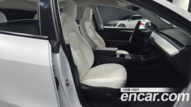 Tesla Model Y 2024 — photo 16