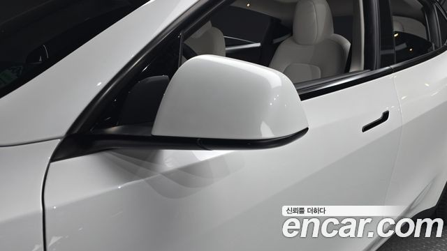 Tesla Model Y 2024 — photo 31