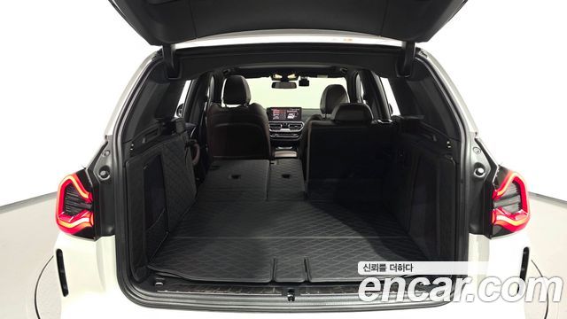 BMW iX3 2024 — photo 20