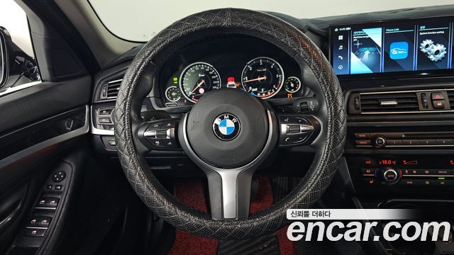 BMW 5-Series 2016 — photo 13