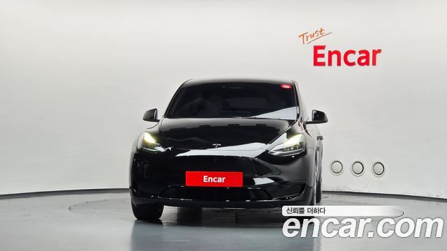 Tesla Model Y 2024 — photo 3