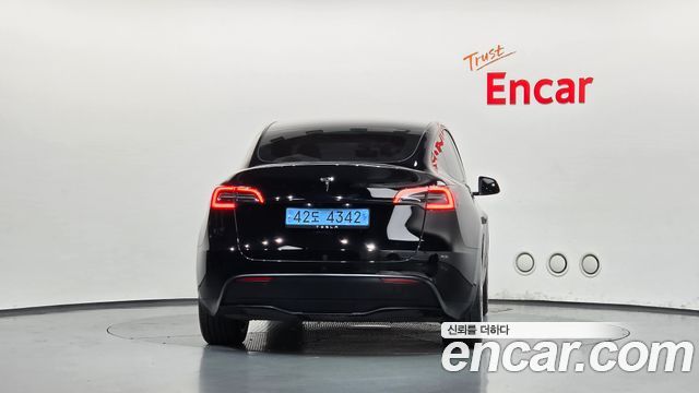 Tesla Model Y 2024 — photo 4