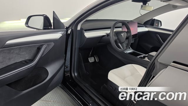Tesla Model Y 2024 — photo 13