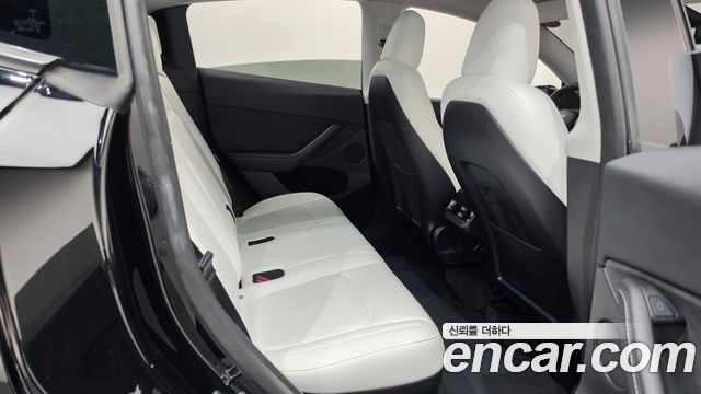 Tesla Model Y 2024 — photo 17