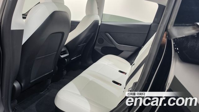 Tesla Model Y 2024 — photo 25