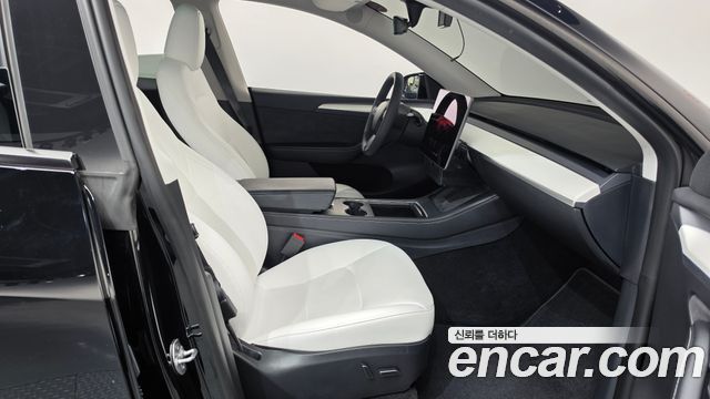 Tesla Model Y 2024 — photo 16