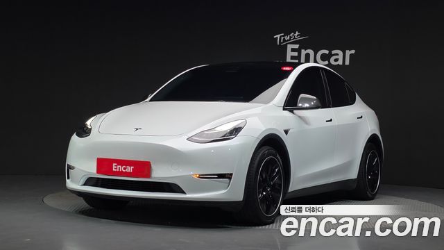 Tesla Model Y 2022 — photo 1