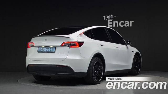 Tesla Model Y 2022 — photo 2