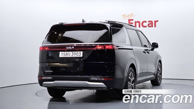 Kia Canival 2023 — photo 2