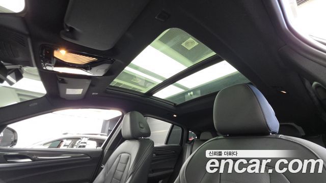 BMW X4 2023 — photo 24