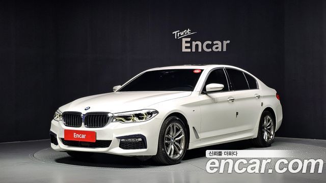 BMW 5-Series 2018 — photo 1