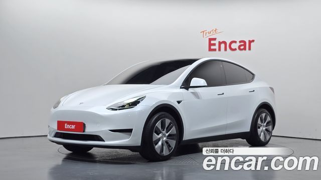 Tesla Model Y 2024 — photo 1