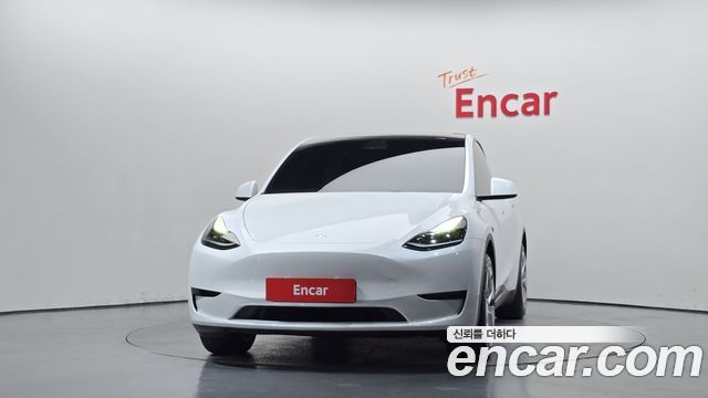 Tesla Model Y 2024 — photo 3