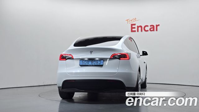 Tesla Model Y 2024 — photo 4