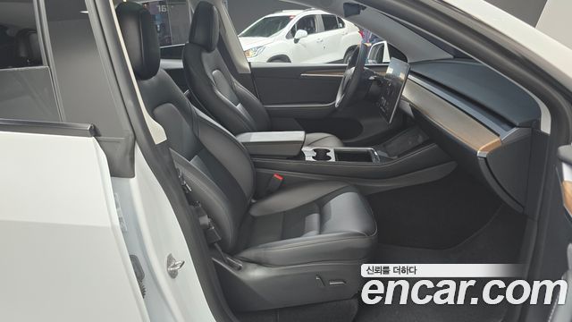 Tesla Model Y 2024 — photo 11