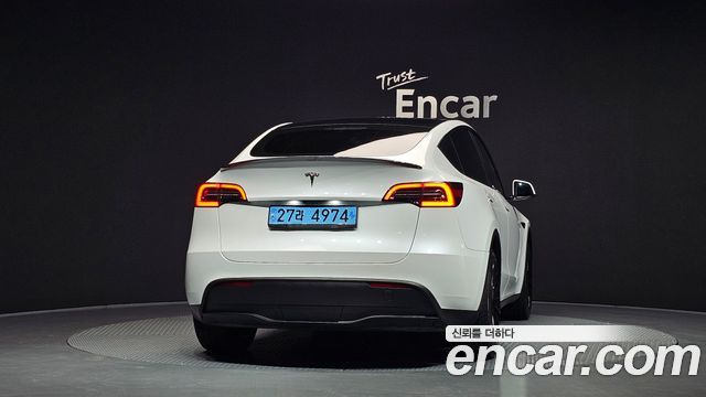 Tesla Model Y 2023 — photo 4