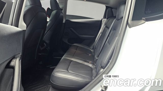Tesla Model Y 2023 — photo 18