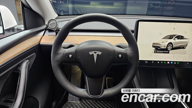 Tesla Model Y 2023 — photo 19