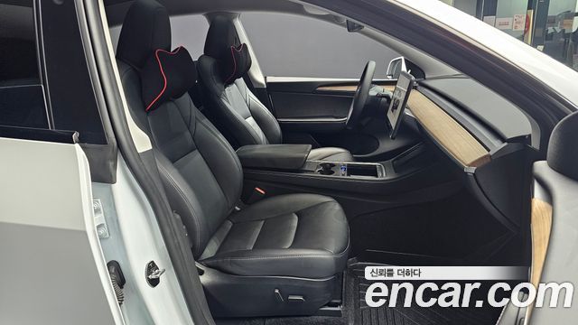 Tesla Model Y 2023 — photo 16
