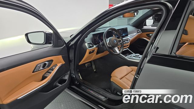 BMW 3-Series 2023 — photo 13